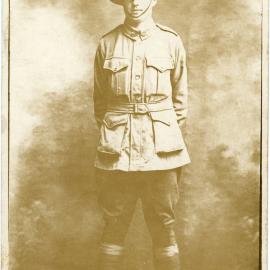 Frank Urquhart dressed in army uniform, [1916]