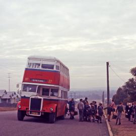 Rover Motors Bus Co Leyland OPD1-1 4819 (x DRT&T 1834), collecting school children, local street, Kurri Kurri, NSW, 25 May 1970