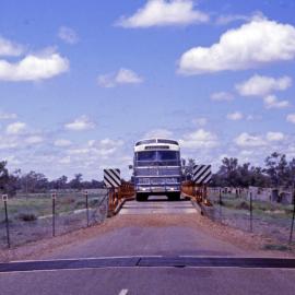 PTC Denning GM MO-4702, bridge & cattle grid between Walgett & Lightning Ridge, NSW, 30 October 1976