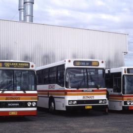 Busways Scania K92 MO-1198 (185), Scania K93 MO-1532, Mercedes O405 8579 (202), depot yard, Charmhaven, NSW, 16 August 2003