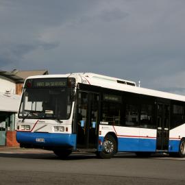 STA Volvo B10BLE 3874 leaving depot yard, Denison Street, Hamilton, NSW, 6 August 2013