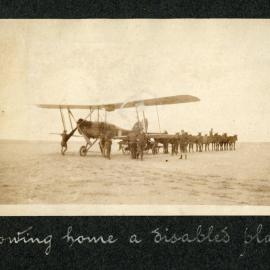 Towing home a disabled plane