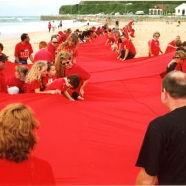 Giant Red Ribbon for World AIDS Day; Newcastle Beach