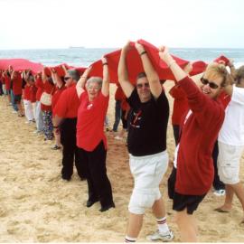 Giant red ribbon, World AIDS Day, Newcastle Beach