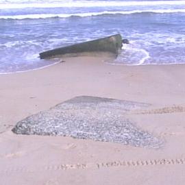 Erosion on Stockton Beach revealing army post, January 2006, Stockton, NSW