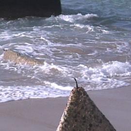 Erosion on Stockton Beach revealing tank trap, January 2006, Stockton, NSW