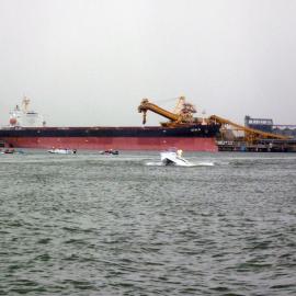 Bulk carrier "Stalo" being loaded, speedboats, Newcastle Harbour, NSW, 26 January 2013