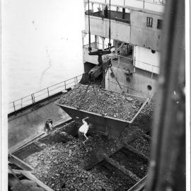 Pin Boss opening waggon door, hatch nearly complete, 1956 