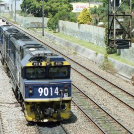 9014 and a classmate on unit 7 seen between Scholey Street and Waratah as they head to a mine in the Hunter Valley.