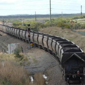 A coal train crossing the Hunter River bridge on the Kooragang branch, August 2014