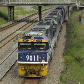 9011 and two classmates on unit 6 power past Beresfield on the down coal road, November 2018