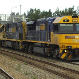 TT05, a 92 class and another TT class on unit 19 roll past Victoria Street, East Maitland along the down coal road, 15 January 2015