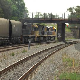 TT05, 9211 and TT03 roll towards East Maitland as they head towards a coal mine in the Hunter Valley, 15 January 2015