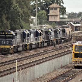 8213, with 8224, a 90 class, 9025 and 9030 powering through Maitland, NSW, July 2011