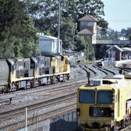 Three QR National 5000 class locomotives with a coal train passing through Maitland on their way to a mine in the Hunter Valley