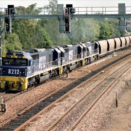 8212, 8255 and 8252 on unit 5 passing through Maitland on their way to Kooragang or Port Waratah, NSW, April 2003