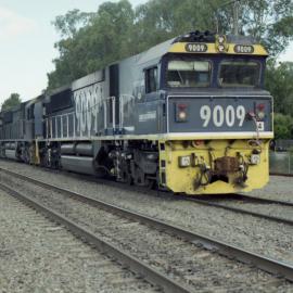9004 and two classmates on unit 4 wait on the down coal road at Maitland for the road before heading to a mine in the Hunter Valley
