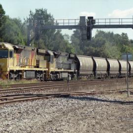 Aurizon 5022 and a classmate on unit 61 pass through Maitland on their way to Port Waratah or Kooragang, NSW, April 2011