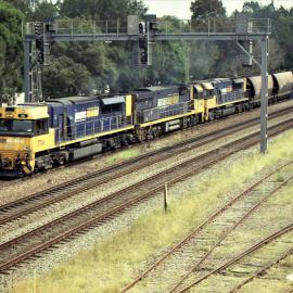 TT08, a 92 class and another TT class on unit 14 heading along the up coal road at Maitland, NSW, April 2016