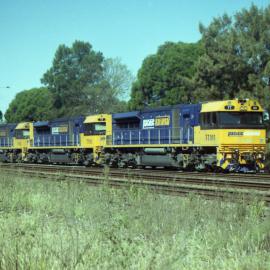 TT101, TT103 and another TT class drift through Maitland on their way to a mine in the Hunter Valley, NSW, April 2011