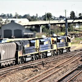 Three 92 class locomotives head north through Maitland to a mine in the Hunter Valley, July 2014