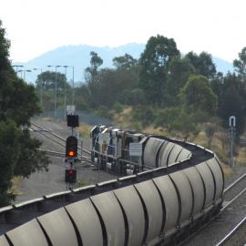 Three ninety class locomotives easing a coal train into the Pacific National servicing sidings at Greta, NSW, 15 February 2017