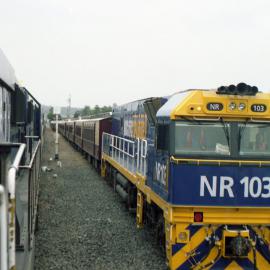 NR103 seen on the Great South Pacific Express at Singleton from a coal train