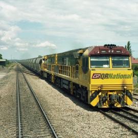 QR National 5001 and a classmate heading north at Singleton, NSW, March 2006