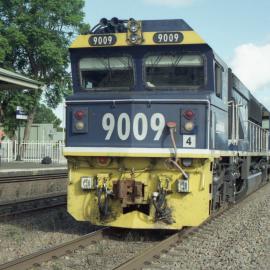9009 and two classmates on unit 4 wait at Singleton as a crew change takes place, NSW, February 2012