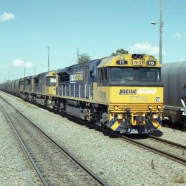 TT113 and two more TT class locomotives on unit 27 head north through Singleton, NSW, May 2013