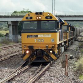 TT03 and two other TT class locos on an up coal train coming through Singleton, NSW, April 2014
