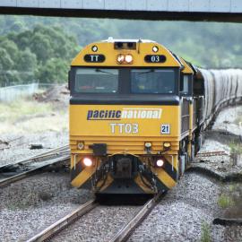 TT03 and two other locomotives on a loaded coal train approaching Singleton, NSW, April 2014