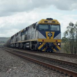 CF4404 and two classmates on unit 15 head north through Mount Owen Junction, NSW, December 2013