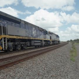 CF 4404, CF4405 and a classmate powering north through Mount Owen Junction, NSW, December 2013
