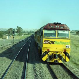 QR National 5008 heads unit 62 on a down coal train at Mount Owen Junction, March 2006