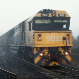 9033 and two classmates wait to leave the Hunter Valley, Newdell, Liddell Loop on a foggy morning. August 2013