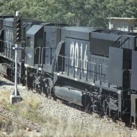 9012, 9016 and 9034 pause during loading at Drayton, NSW, August 2013