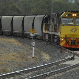 Aurizon 5023 and a classmate on unit 77 approaching Werris Creek with a loaded coal train, 1 August 2015