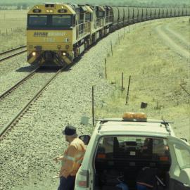 A relief crew waits as TT02 approaches at Sandy Hollow, January 2014