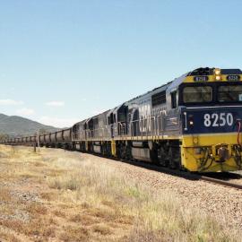 8250 and two classmates on an empty coal train waiting in the loop at Coggan Creek on their way to Ulan, NSW