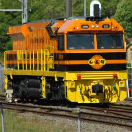 XRN026 just repainted in G&W colours drifts past Broadmeadow station on its way to Port Waratah, NSW, December 2017