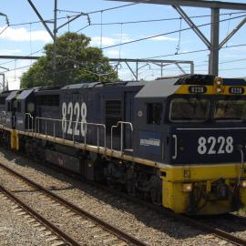 8228, 8211 and two classmates with unit 59 amble past Broadmeadow on the up relief road, 23 December 2018