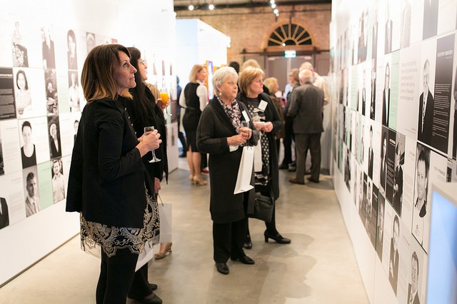 Guests at the opening of UON's 'Our community, your university' 50th anniversary exhibition